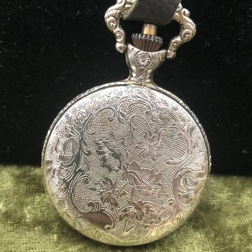 Silver-Tone Pocket Watch with Black Leather Strap man fishing